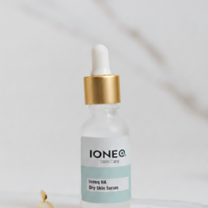 A product picture of a glass dropper bottle with a white and gold top.