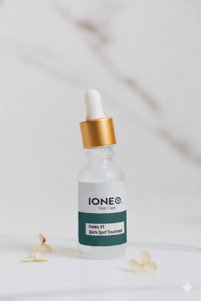 A product picture of a glass dropper bottle with a white and gold top.